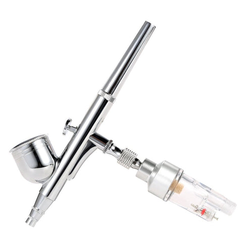 Airbrush with Inline Airbrush Filter With Five Micron Water Moisture Trap And Oil Separator With One Eighth Inch Threads attached