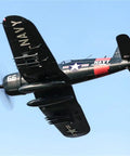 Six Channel RC Warbird Plane With 1700mm Wingspan F4U Corsair V3 PNP Kit in flight showcasing navy design and four blade propeller