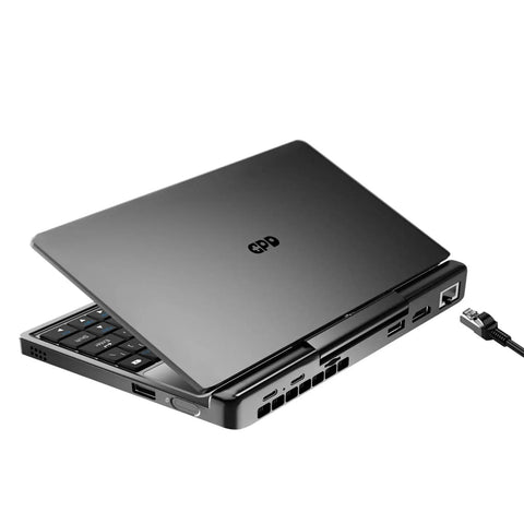 Badass 7 Inch FHD Touchscreen Mini Laptop PC Featuring Intel Core I3 N300 Eight Core Processor With 16GB RAM And 512GB SSD Drive Plus Fast WiFi 6 Hotspot For Daily Grind, angled view showcasing ports and keyboard.