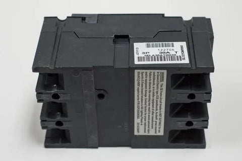Tough As Nails Three Pole Circuit Breaker Rated 100 Amps At 600 Volt AC featuring a black molded case design for heavy duty use.
