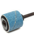 Solid Workhorse One Inch Rubber Expanding Drum Sander With One Quarter Inch Mandrel Rotary Sanding Attachment Fits Drill And Die Grinder Smashes Through Rust Fast And Leaves A Killer Polish, close-up view of blue sanding drum.
