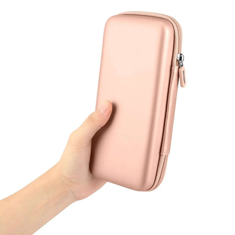Roomy Tech Gear Organizer Pouch Featuring Smart Cable Stash Design holding in hand, 8.5 x 4.5 x 2 inches, shockproof EVA material.