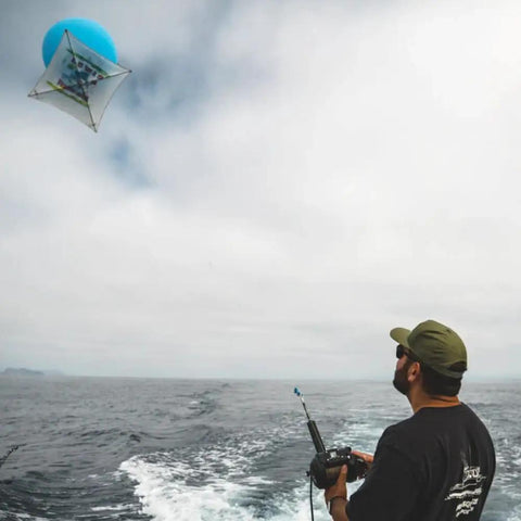 Man using Tanacom 1200 Power Assist Electric Reel For Deep Drop And Kite Fishing In Saltwater, Heavy Duty Electric Line Retriever