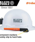 Skribes Fine Tip Permanent Marker 12 Pack For Worksite And Multi Surface Use clipped to a hard hat for easy access on job sites.