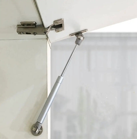 50N 11 Lb Gas Struts 10 Inch Lift Supports Gas Spring Lid Support For Cabinets Toy Boxes Tool Boxes Cars 2 Pack Silver Soft Open Hinges Durable Metal Gas Props Shocks installed on cabinet