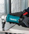 Person using 16 Gauge Nibbler for sheet metal cutting, ultra light 3.6 lb tool with 360 degree die and slim ergonomic grip