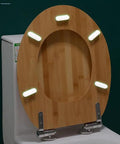 Heavy Duty Solid Wood Elongated Toilet Seat With Smooth Soft Close Lid Quick Release Hardware And Nonslamming Design on toilet.
