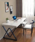Modern desk with heavy duty cast iron table legs 28 inch high by 20 inch wide, set of 2 black finish, laptop on white tabletop