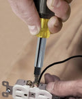 Heavy Duty 10 In 1 Multi Bit Screwdriver Nut Driver With Interchangeable Shafts and Six Universal Tips being used on outlet