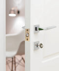Stunning Golden Roller Latch With Adjustable Tension For Closet Cupboard Door Hidden Beads Lock Hardware on a white door.
