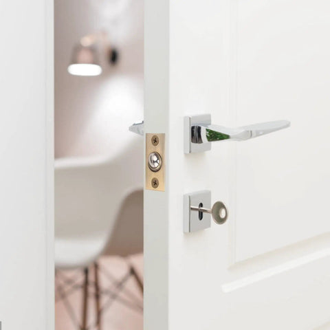 Stunning Golden Roller Latch With Adjustable Tension For Closet Cupboard Door Hidden Beads Lock Hardware on a white door.