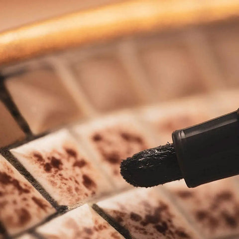 Close-up of Easy Fix White Tile Grout Paint Marker Kit 5 Pack With Narrow 5mm Tips Waterproof Colorant on tile edge