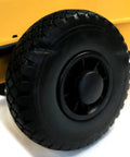Job Site Beast 135000 Btu Forced Air Kerosene And Diesel Heater wheel detail, robust black tire designed for mobility.