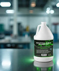 1 gallon Green Cutting Coolant For Plasma Cutters And CNC Cutting Tables in workshop setting on metal surface