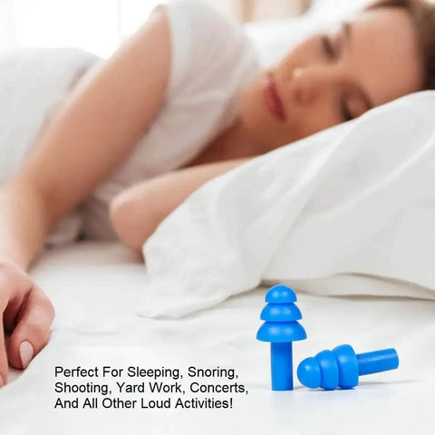 Soft Reusable Silicone Ear Plugs For Swimming Sleeping And Concerts With Individually Wrapped Waterproof Ear Protection shown on bed