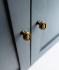 Antique Brass Double Ring Oval Cabinet Knobs Set Of 12 For Kitchen And Furniture Vintage Hardware With Concave Center Design on blue cabinet