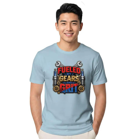 Fresh Engineer Gear Badge Tee For Mechanics And Makers Cool Mechanical Engineering Industrial Gift Shirt For Tinkerers With Grit Garage Vibes And Workshop Energy Modern Vector Print Design on a man wearing a light blue t-shirt.