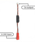 Ultra Compact Buck Converter Module 6 to 24V In 5V Out 1.5A Max For Easy Step Down Power Regulation black component with red and black wires.