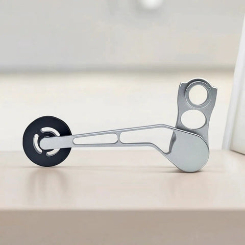 Rear Derailleur Chain Tensioner With 11T Pulley For Folding Bikes in silver aluminum, showcasing pulley and arm design.