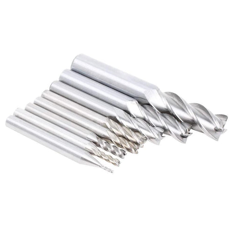 Angled side view of a set of eight HSS 4-flute straight end mills in sizes 1/16–1/2 in.