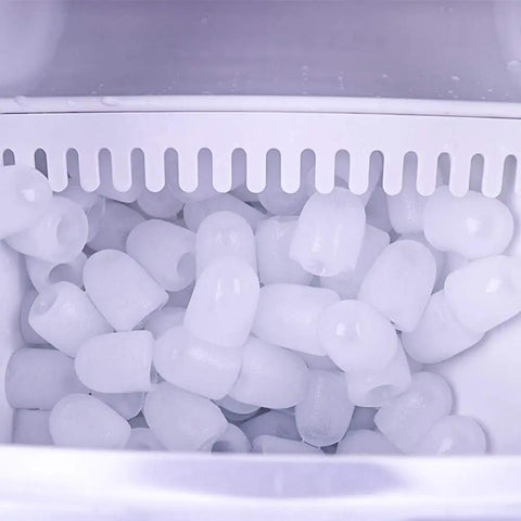 Close-up of ice cubes inside the Top Shelf Countertop Automatic Ice Dispenser With Food Grade Abs Shell And Fast 12 To 15kg Production For Hassle Free Home Mixology Smooth Touch Buttons.