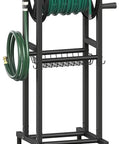 Beefy Freestanding Garden Hose Reel that holds one hundred twenty five feet of five eighths inch hose, black metal stand with hooks