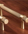 2 Pack Solid Brass Cabinet Pulls 5 Inch Hole Centers Gold Knurled Textured Bar Handles on wood surface