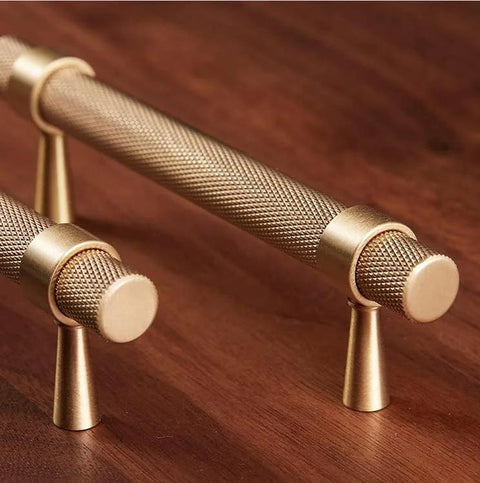2 Pack Solid Brass Cabinet Pulls 5 Inch Hole Centers Gold Knurled Textured Bar Handles on wood surface