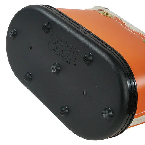 Hard Body Tool Bucket With 15 Interior Pockets Aerial Oval Design Non Conductive Plastic Exterior And Durable Polypropylene Bottom Drain Holes For Quick Dry Keeps Your Tools Organized Safe And Ready Between Jobsites, showing the durable polypropylene bottom with drain holes.