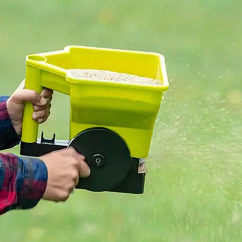 Handheld Grass Seed Spreader For Lawns And Gardens Reusable Fertilizer And Salt Broadcast Spreader Ergonomic Grip in use