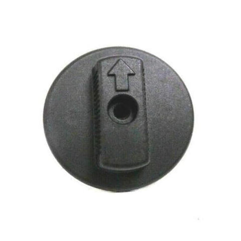 Fuel valve shut-off knob, round black with arrow indicator, top view.
