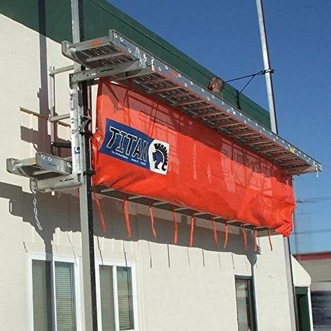 Titan Pump Jack Safety Net, 22 ft long, orange netting with Titan logo, mounted on exterior scaffold.