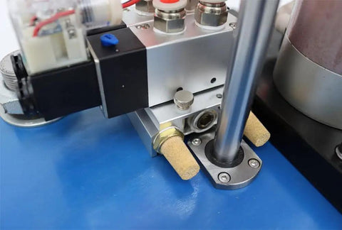 Detailed view of Tough As Nails Pneumatic Punch Press Machine with digital controls and adjustable stroke features.