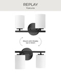 Two-Light Vanity Light In Slick Textured Black With Etched White Glass Shades For Over The Mirror Modern Bathroom Fixture, reversible mounting shown.