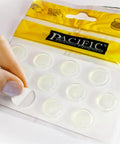 Clear Silicone Glass Table Bumpers Deliver A Snug Anti Slip Fit That Really Locks Furniture Down And Kills That Annoying Slide Heavy Duty Adhesive, 16mm pads being peeled from pack.