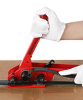 Heavy Duty Black PET Strapping Kit With Tensioner And Cutter, 5/8 Inch X 1000 Feet in use on cardboard box.