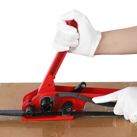 Heavy Duty Black PET Strapping Kit With Tensioner And Cutter, 5/8 Inch X 1000 Feet in use on cardboard box.