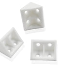 Three white plastic right angle brackets for woodworking, durable material, part of Twenty Piece Pack Of White Right Angle Brackets Heavy Duty Plastic L Shape Corner Braces For Woodworking Diy Builds Durable Corrosion Proof Hardware Fasteners Built To Rock.