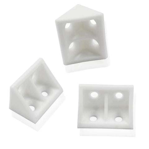 Three white plastic right angle brackets for woodworking, durable material, part of Twenty Piece Pack Of White Right Angle Brackets Heavy Duty Plastic L Shape Corner Braces For Woodworking Diy Builds Durable Corrosion Proof Hardware Fasteners Built To Rock.