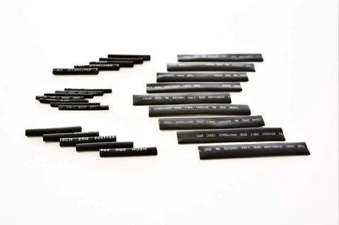 2 To 1 Heat Shrink Tubing Kit For Wires And Cables, 127 Piece Assortment in seven sizes, black tubing sleeves on white background