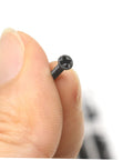 Close-up of a miniature flat head screw from Two Pack 18 18 Specification Screw Set for laptop repair and DIY projects.