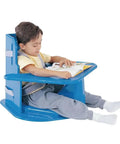 Kids Corner Chair With Tray For Positioning Aid Perfect For Fine Motor Activities And Schooling Supports Focus For Children Up To 60 Inches Tall Easy Setup Durable Design For Home Or Classroom Use Helps Keep Shoulders Flexed, child reading in blue chair.