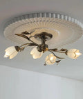 Farmhouse Wrought Iron 4 Light Chandelier In Bronze Finish, Rustic Flower Style Ceiling Fixture With Frosted Glass Shade