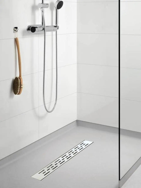 Modern bathroom with 24 Inch Linear Shower Drain With Bar Pattern Grate Stainless Steel AISI 304 Built To Last Rustproof