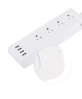 Totally Smooth Smart Power Strip With Four Wall Outlets And Four USB Charging Ports shown from above, featuring a compact design and fireproof material.