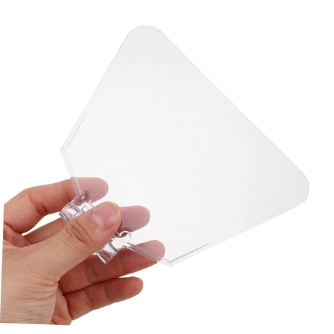 Hand holding a piece from 4 Pack Transparent Bench Grinder Guard Shields Eye Shield Replacement For Workshop Use, Durable Protective Covers.