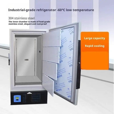 Top Tier Heavy Duty Ultra Low Temp Upright Mini Fridge Freezer For Lab Samples And Supplies Compact Deep Freeze Cold Storage Solution With Rugged Construction And Bulletproof Reliability open door view with stainless steel interior and shelves.