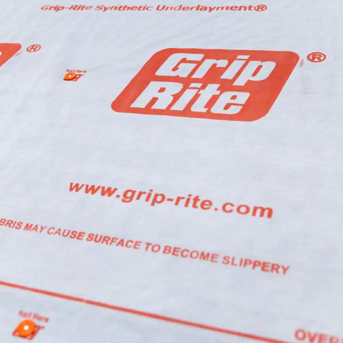 Top Shelf Shingle Underlayment Super Smooth Polypropylene Roofing Paper 4 Ft By 250 Ft Roll Heavy Duty construction material with Grip-Rite logo.