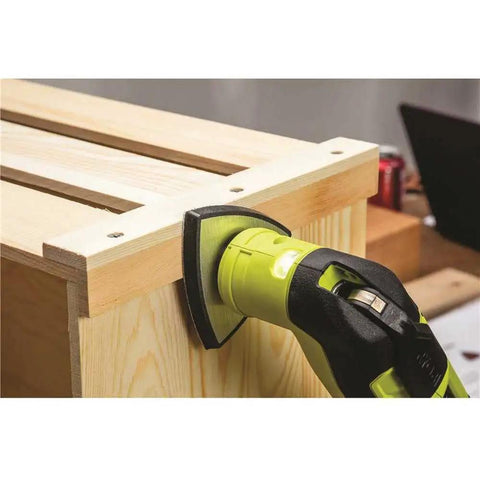 16 Piece Oscillating Tool Blade Accessory Set With Universal Fitment for Quick Cuts sanding a wooden surface