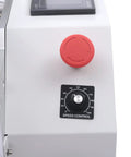 Close-up of speed control dial and red knob on Rock Solid Semi Automatic Round Bottle Labeler Desktop Applicator.